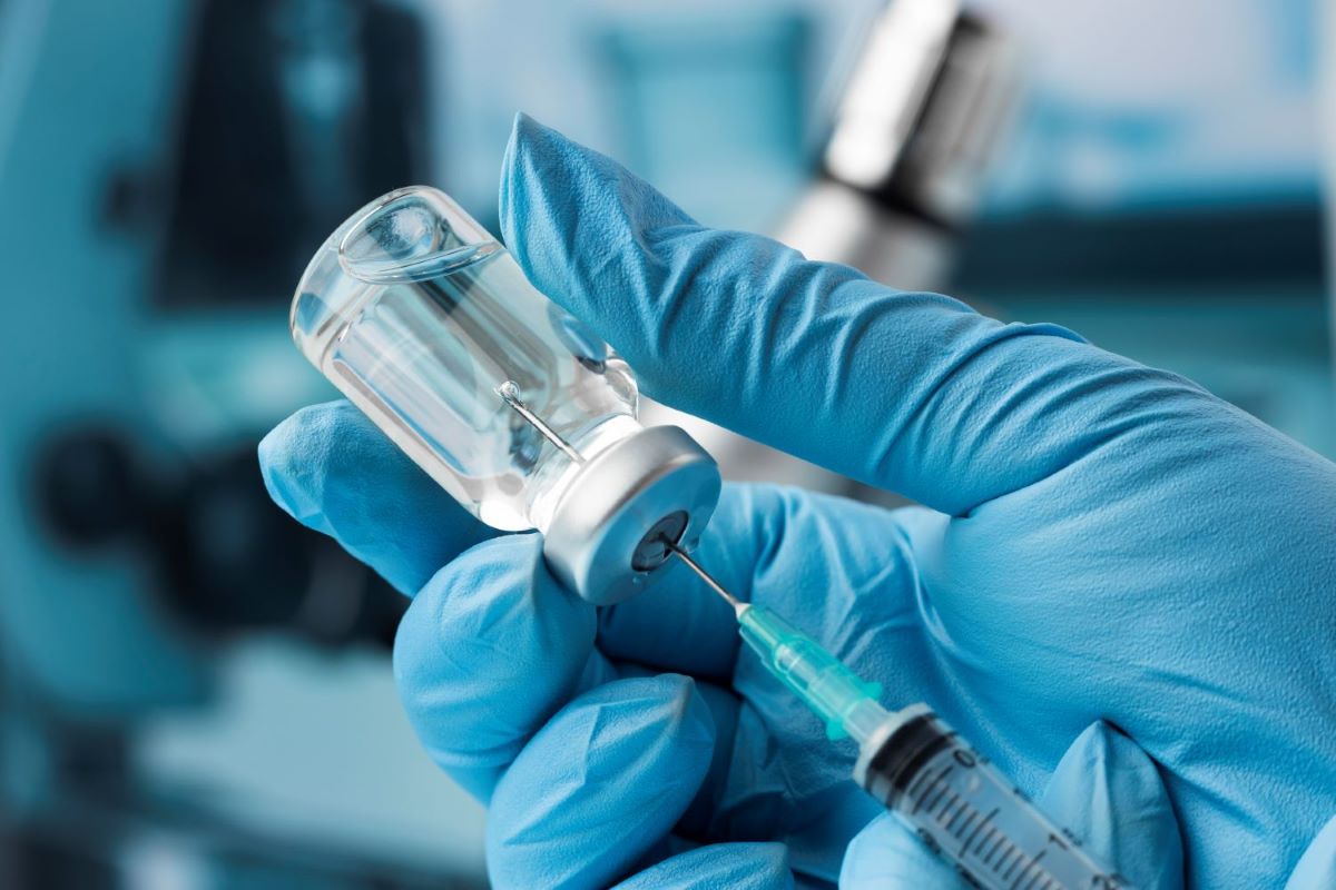 covid still life with vaccine